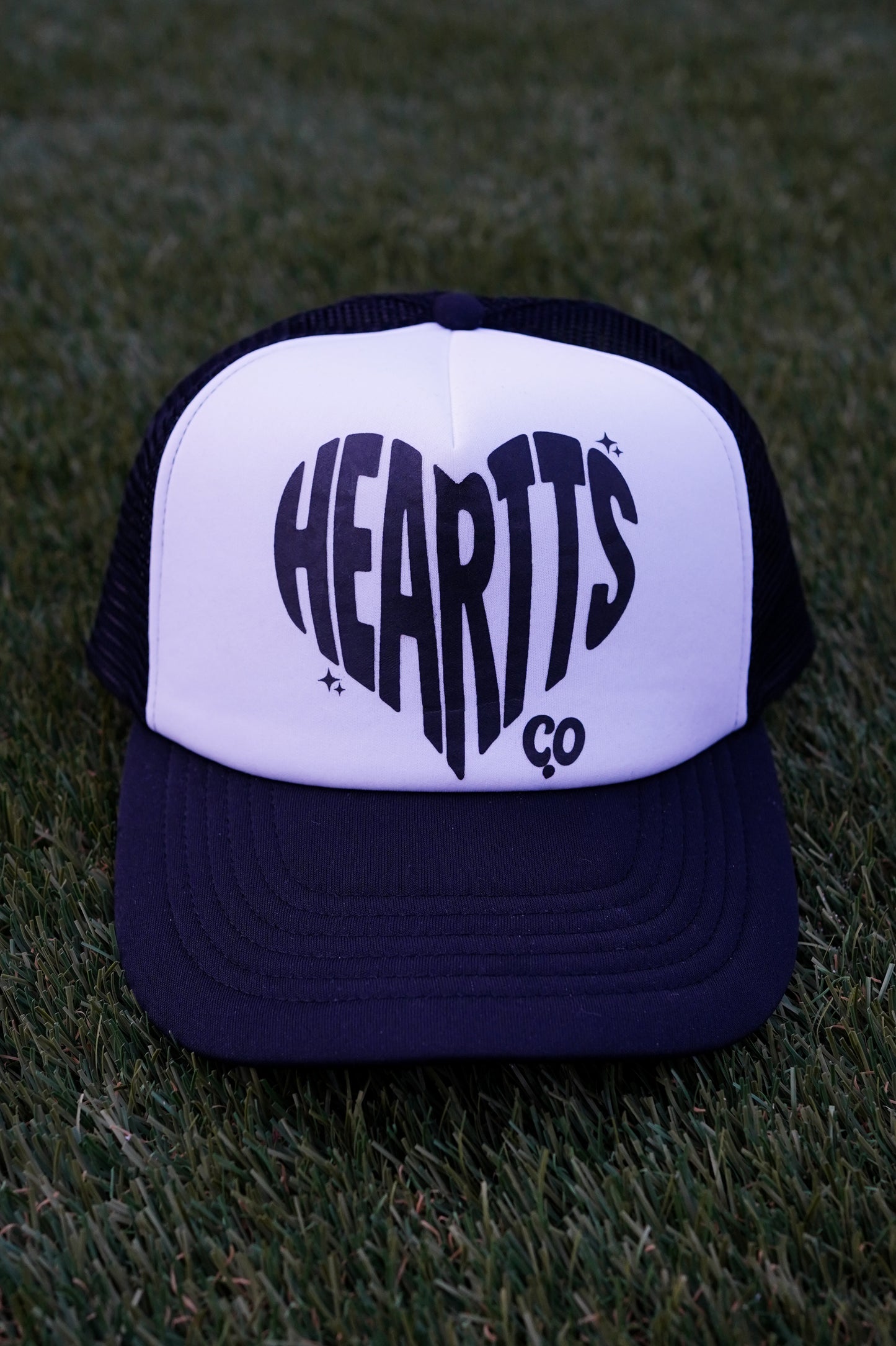THE HEARTTS CO. TRUCKER HAT
