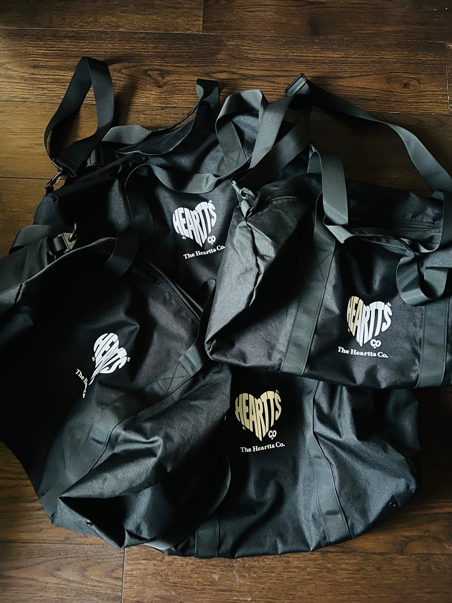 "THE HEARTTS CO." DUFFLE BAG